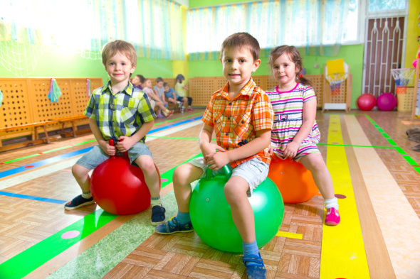 image of the three kids playing